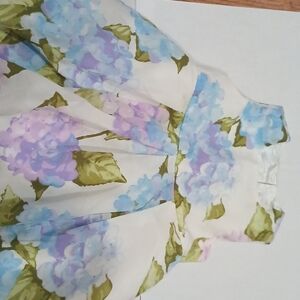 Children place floral dress with blue and purple flowers has tulle and silk